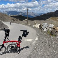 Lone rider coming up the Cime de la Bonette Lone rider coming up the Cime de la Bonette